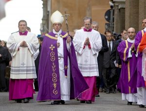 Men dressed in purple and scarlet