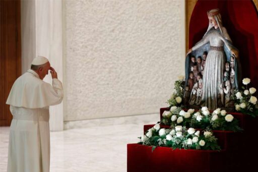 Roman Pontif prays to statues